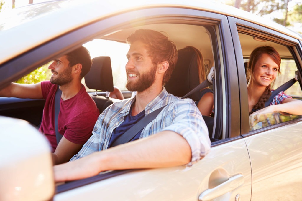 A learner driver carrying passengers.