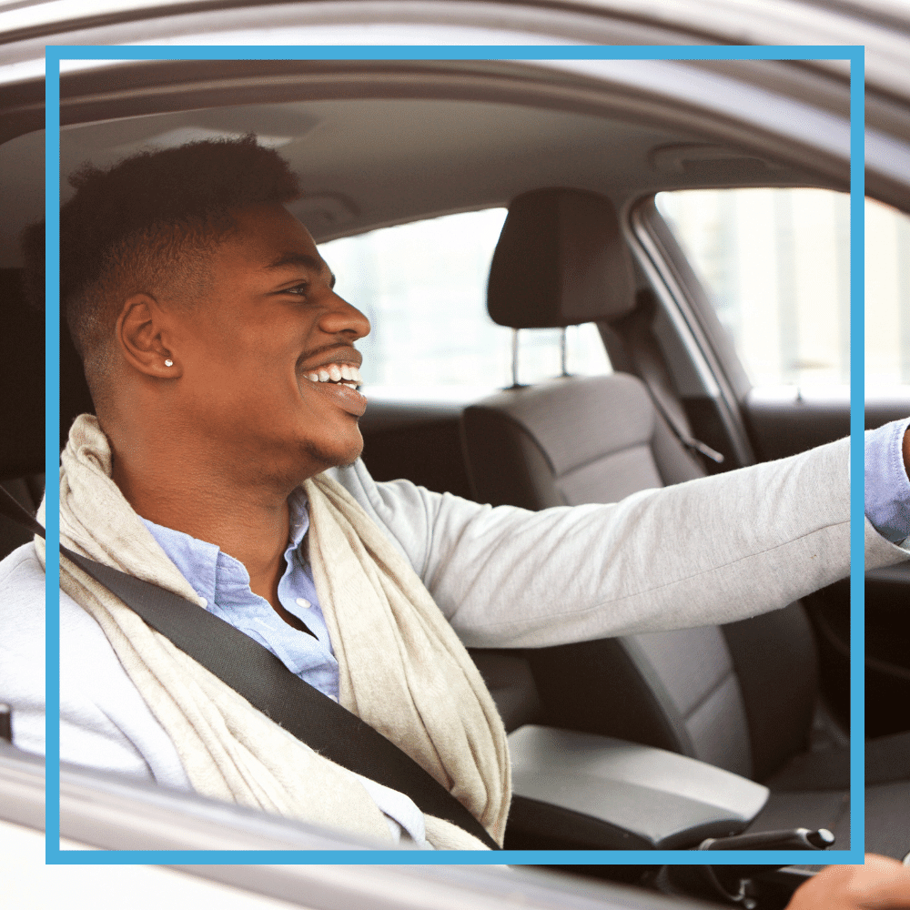 Young Man Driving Car