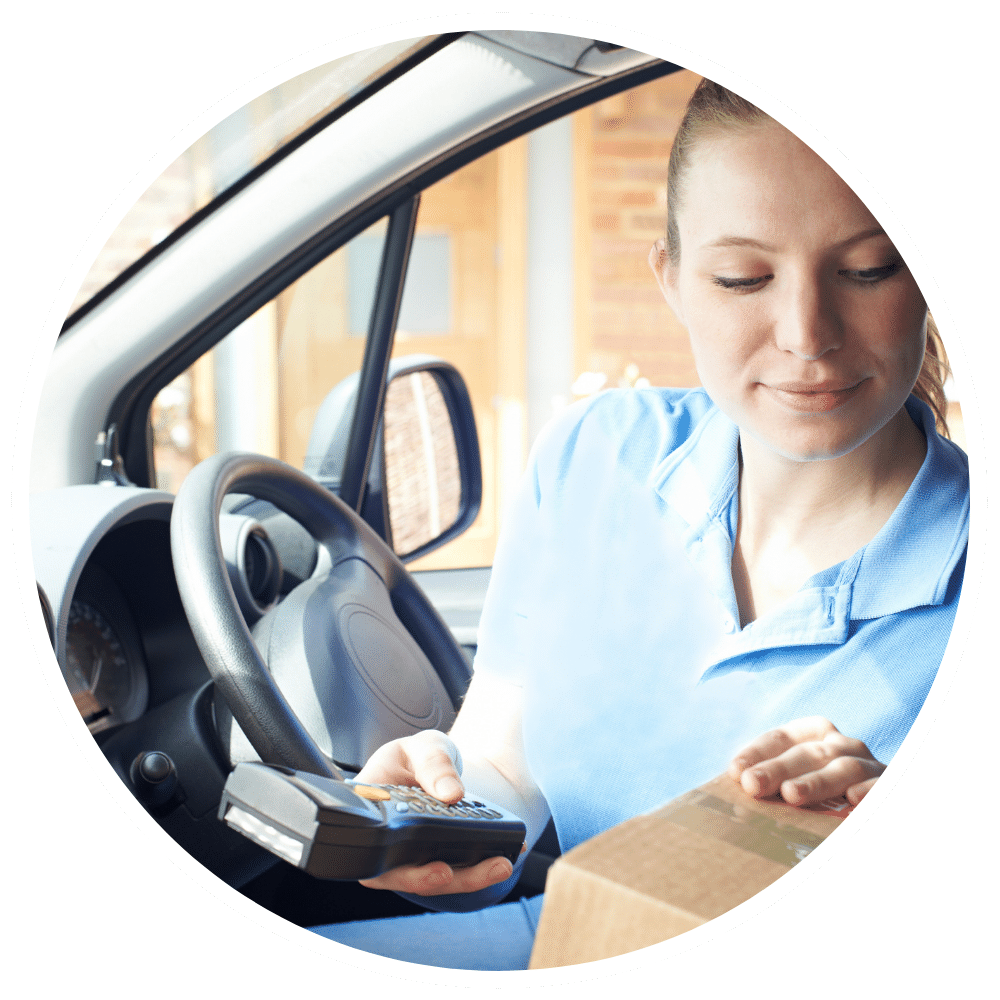 Female Courier Driver Inspecting Parcels