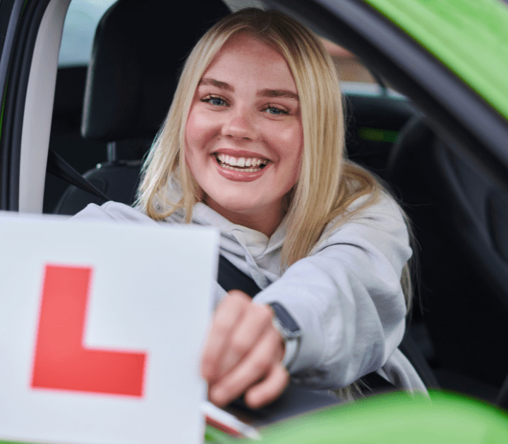 Woman Holding L Plate