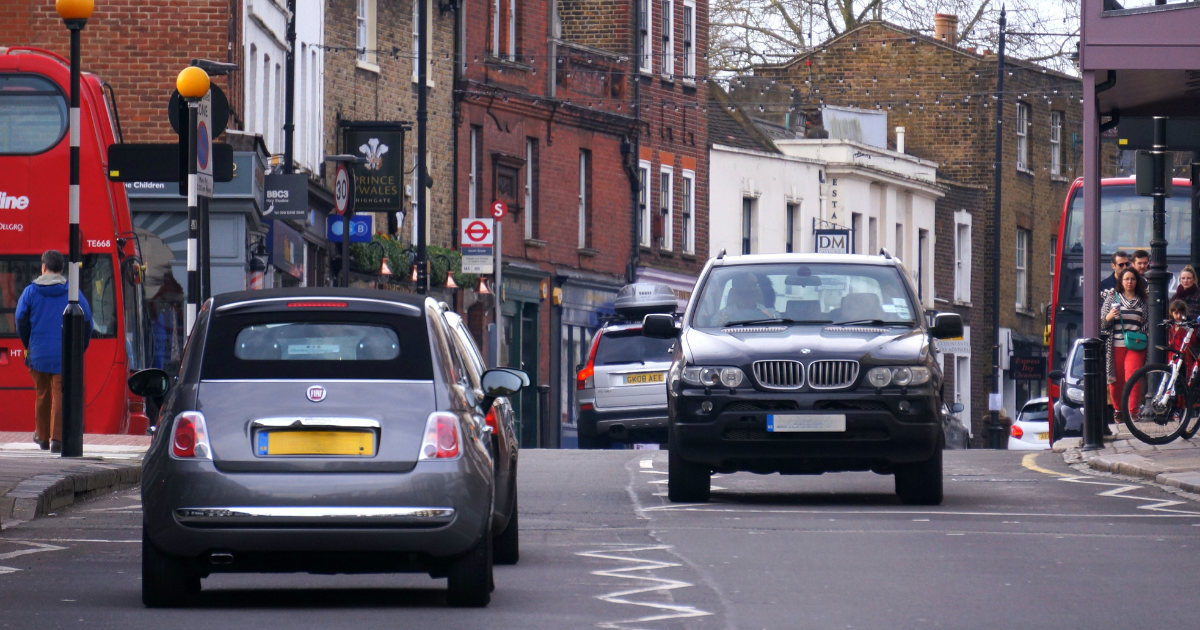 two cars in opposite lanes