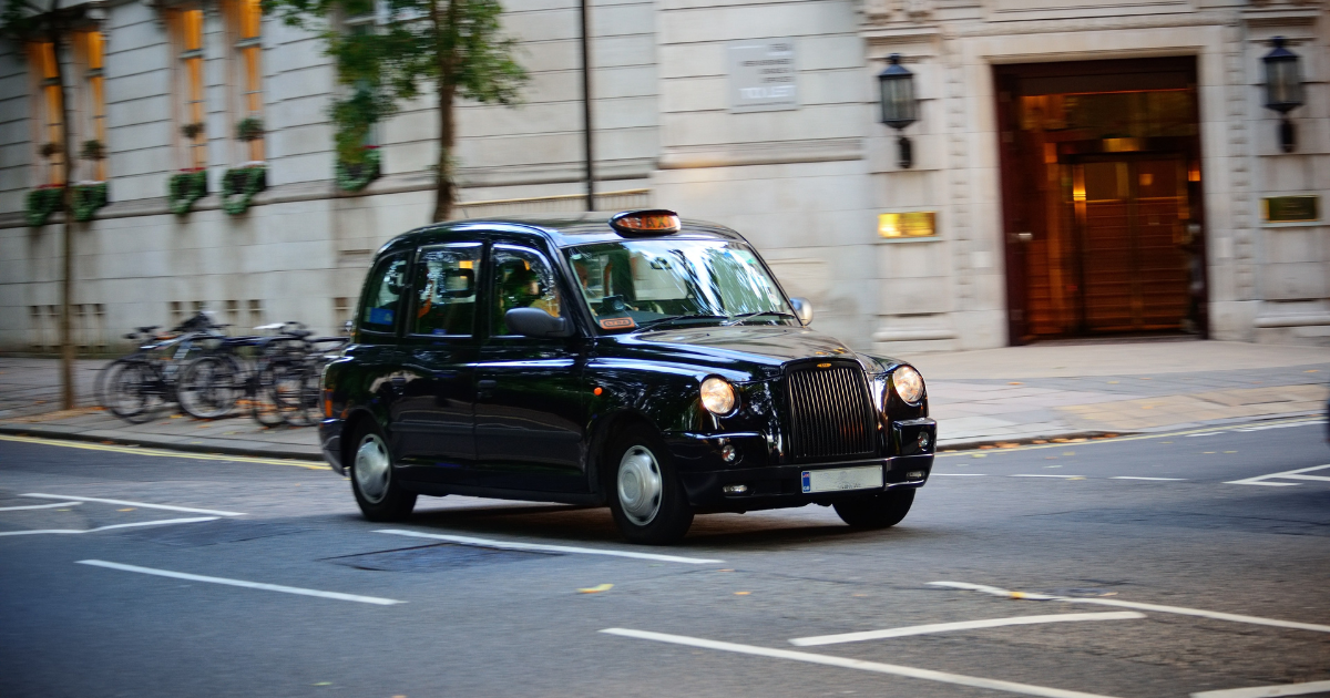 taxi driving on bus lane