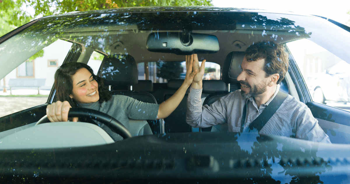 learner driver and instructor in car