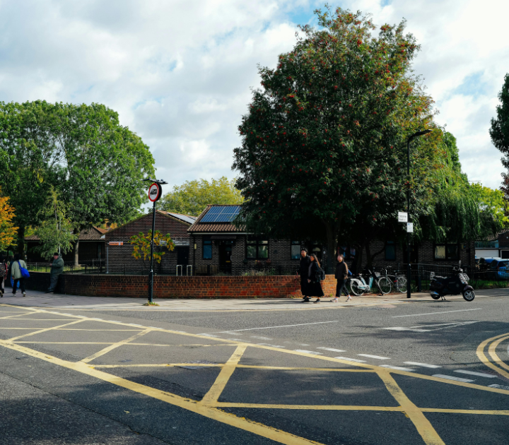 T junction in a residential area with yellow hatchings